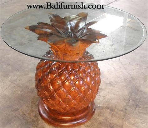 carved wood pineapple glasstop table
