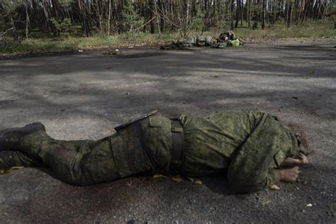 retreating russian soldiers leave bodies  comrades  battle
