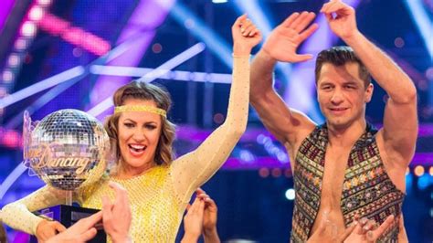 Strictly Come Dancing Caroline Flack Lifts Glitterball Trophy Bbc News