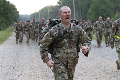 soldiers    troop command participate    mile ruck march
