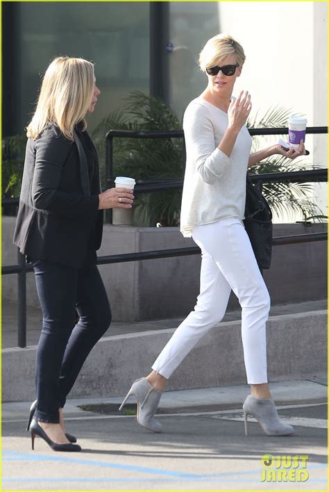Charlize Theron Is A Vision In White For Morning Coffee