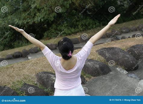 pink lady raise arms outdoors stock photo image  arms optimistic