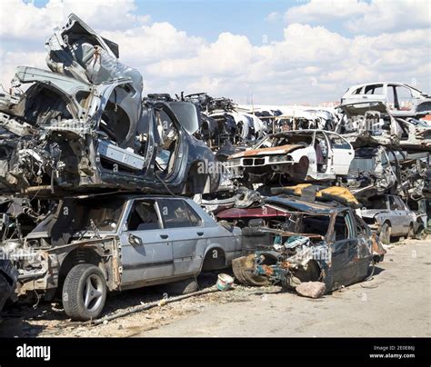 car bodies stacked   junkyard stock photo alamy