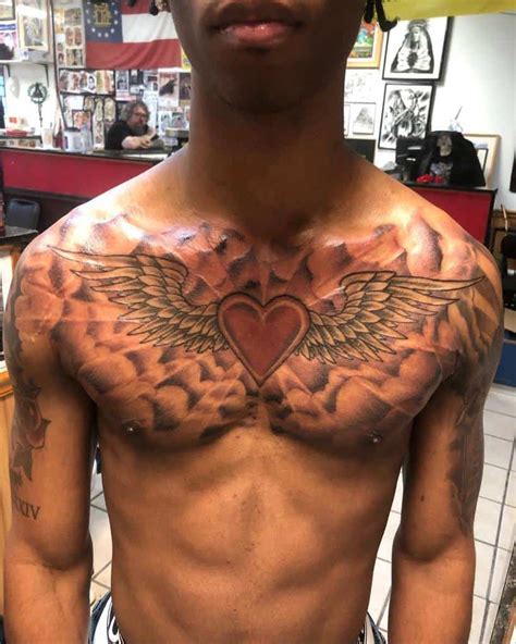 top   heart  wings tattoo ideas  inspiration guide