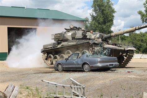 drive  tank experience    drive   ton car crushing armored vehicle