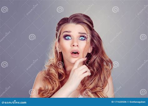 shocking news beautiful shocked surprised curly blonde woman girl with