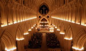 crowds gather under the ecclesiastical arches of wells cathedral for the magical 1 000 year old