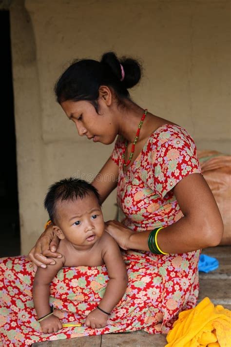 Mother Giving Daughter Massage In Chitwan Nepal Editorial Stock Image