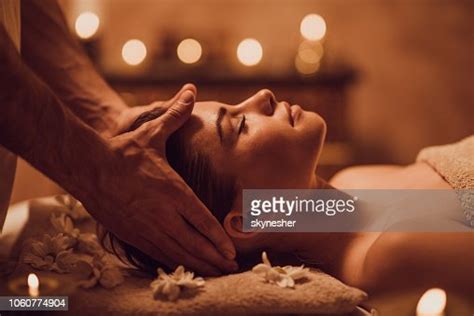 serene woman receiving head massage  beauty spa high res stock photo