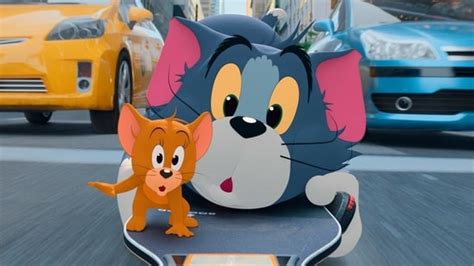 tom and jerry movie review iconic cartoon characters gatecrash a big fat