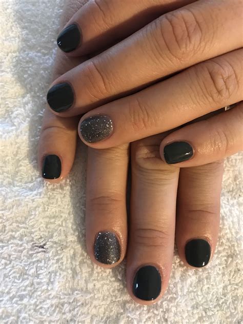 dark gray gel with gray glitter accents nails glitter