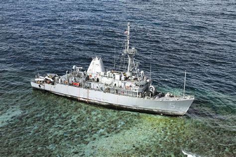 navy ship hits reef declared  complete loss  log