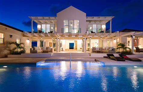 caribique villa rentals announces  contemporary turks  caicos beach villas