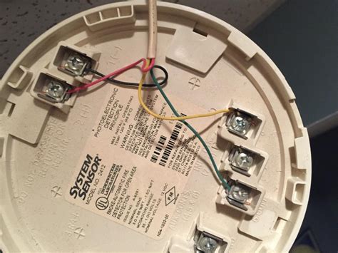 unplug  wired smoke detector   remove    ceiling   screwdriver