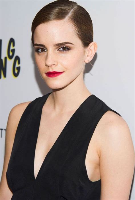 emma watson shows off her sexy side in a low cut dress at