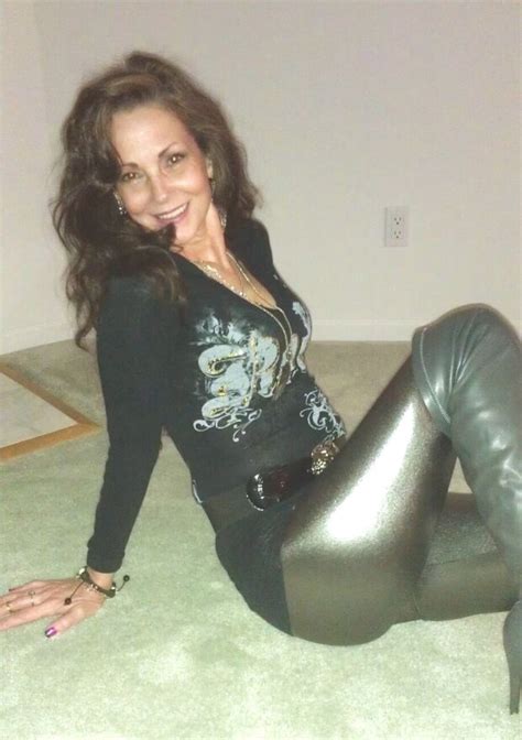 Smiling Brunette Milf In Shiny Leggings And Boots Crimmy