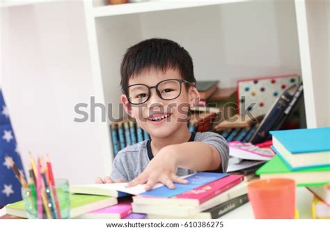cute  child  homework reading stock photo