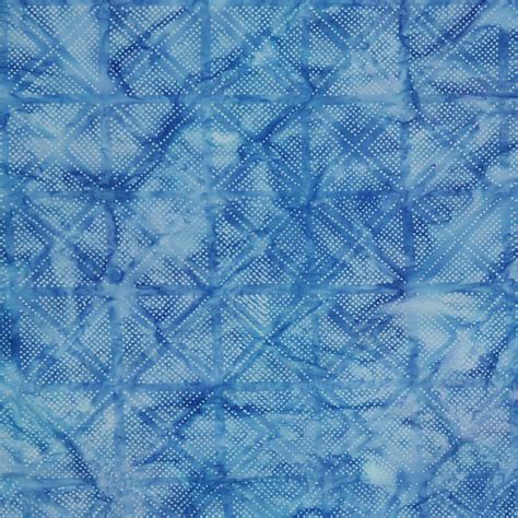 white dots modern blue batik print  cotton fabric  robert kaufman