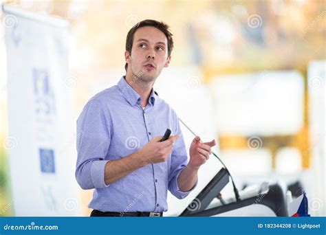 handsome young man giving  speech stock photo image  communication
