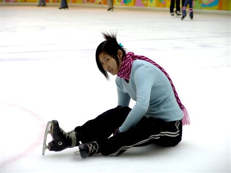 filegirl sitting    ice rink jpg wikimedia commons