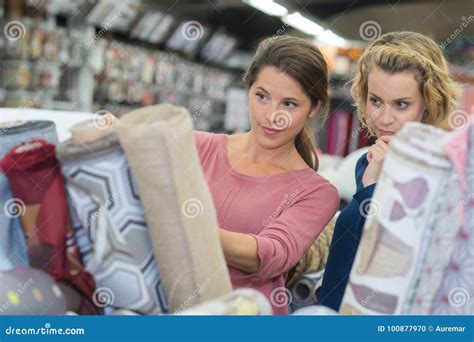 women buying carpet  store stock photo image  sales home