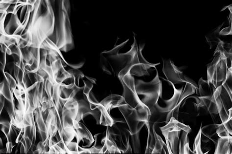 blazing fire flame black  white  background  abstract stock