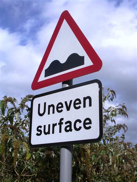 uneven surface road sign stock photo freeimagescom