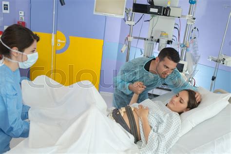 Woman Giving Birth At Hospital