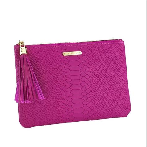 gigi magenta all in one bag embossed python fashionable clutch yet slim enough to slip into