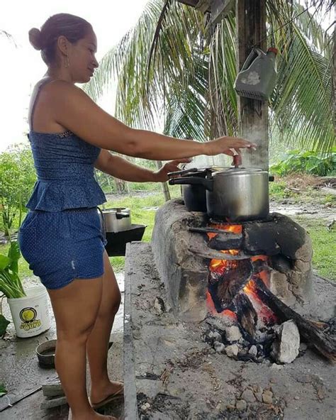 fire pit cooking cooking on the grill very beautiful woman beautiful