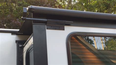 solera rv   awning  wide  projection black lippert components rv awnings
