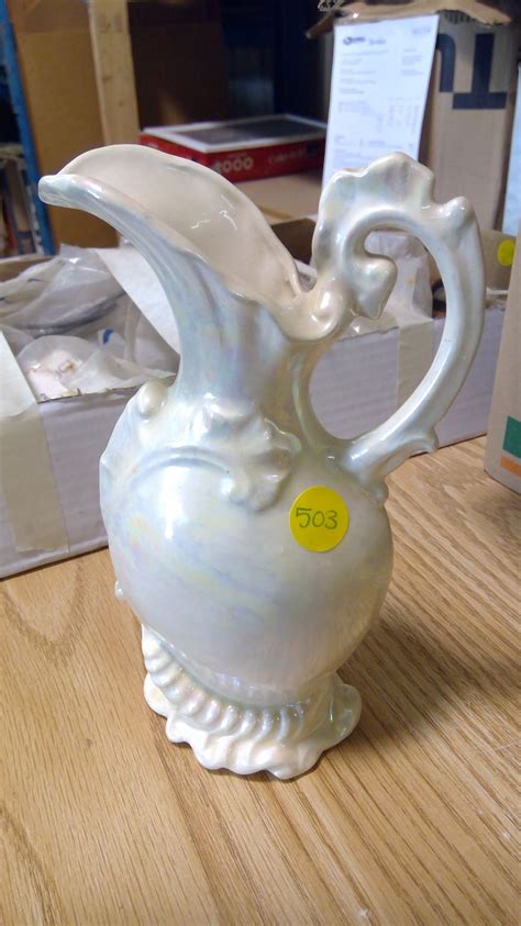 small antique pitcher