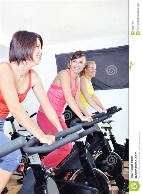 Beautiful Woman Doing Exercise In A Spinning Class Stock