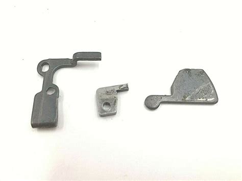 bryco arms jennings  mm pistol parts cam disconnector ejector