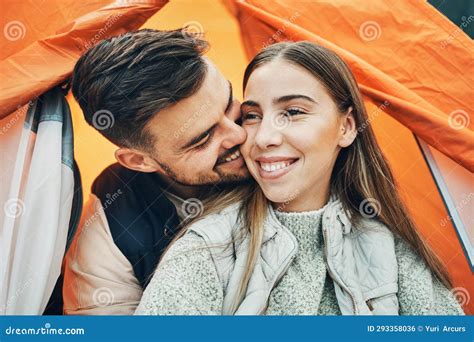 Happy Couple Kiss And Tent For Camping Holiday Or Outdoor Vacation