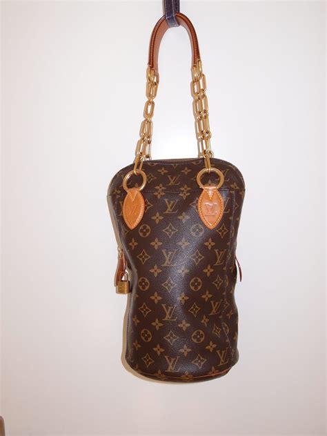louis vuitton punching bag pm  karl lagerfeld occasions luxe