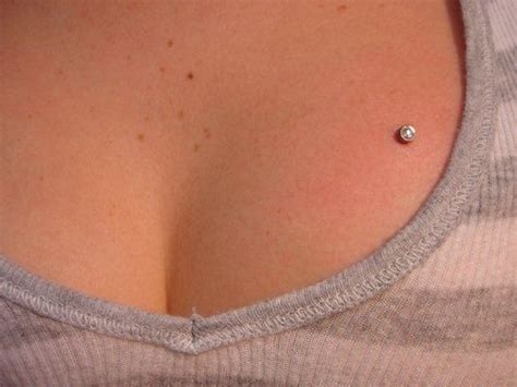 dermal chest piercing chest piercing dermal piercing