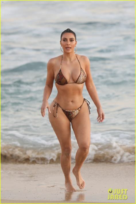 Kim Kardashian Flaunts Her Curves In A Bikini See The Beach Photos