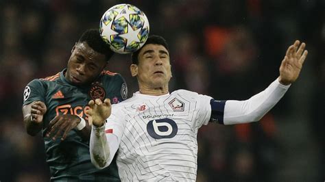 ajax takes control  group     win  lille