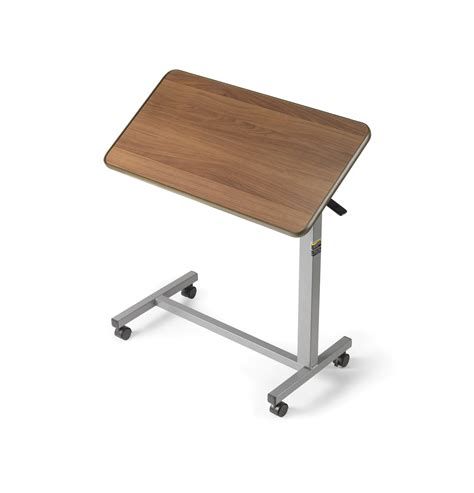 invacare overbed table  tilt top height adjustable