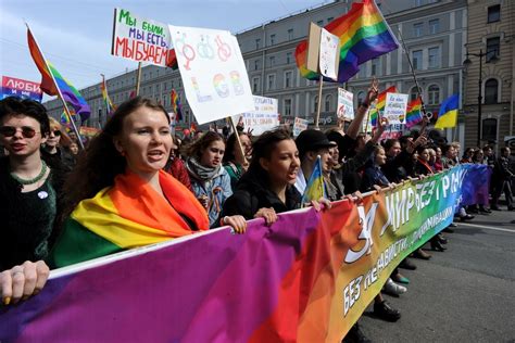 russian lgbt activists march in rainbow may day buzzfeed news