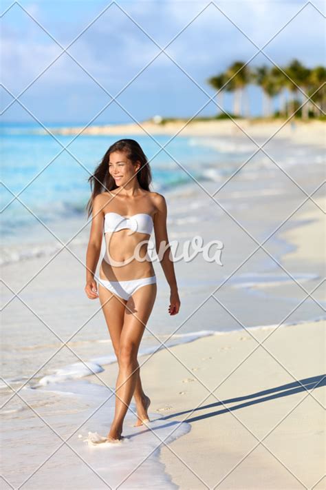 Sexy Asian Bikini Woman Walking On Beach Holidays Photos