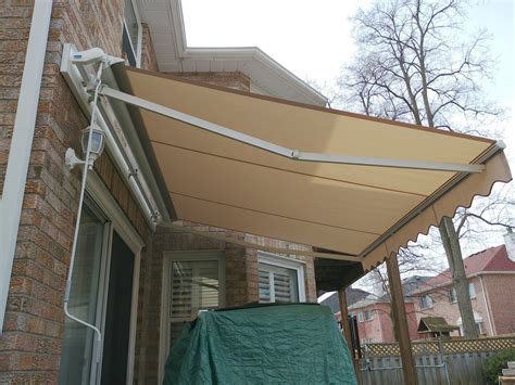 aleko retractable    patio awning ft  ft   solid sand awxsand hd  home