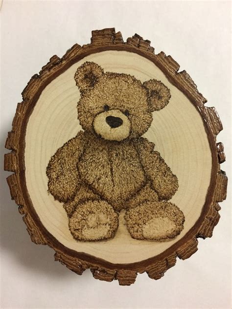 “teddy bear” pyrography on wood slice by tamika savorgnan wood burning