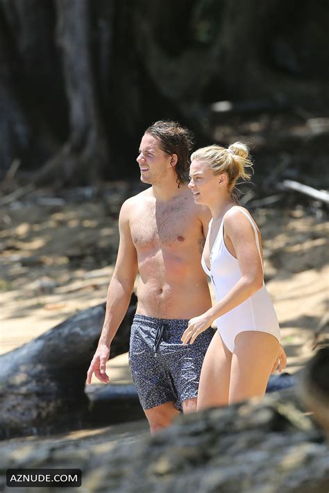 Margot Robbie Sexy In A White One Piece Swimsuit Surfing In Hawaii Aznude