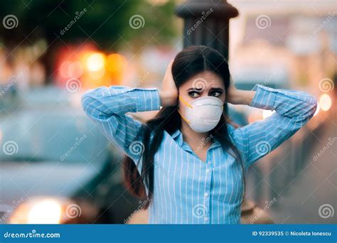 girl  mask covering  ears   noise pollution stock image image  hearing flue