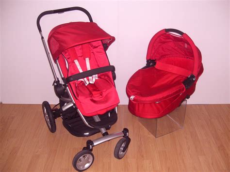 duo quinny rojo incluyendo silla capazo accesorios plastico de