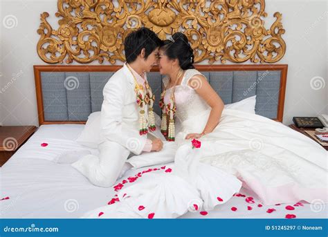 Asian Thai Bride And Groom On A Bed In Wedding Day Stock Image Image