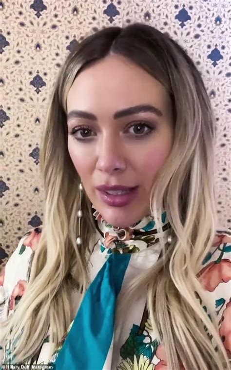 hilary duff struggles to hide her pregnant belly underneath a blouse