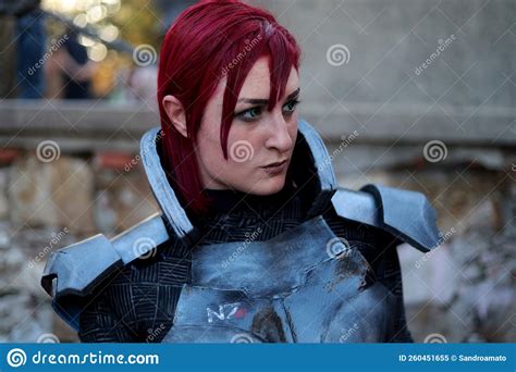 cosplayer girl dressed as jane shepard character from mass effect